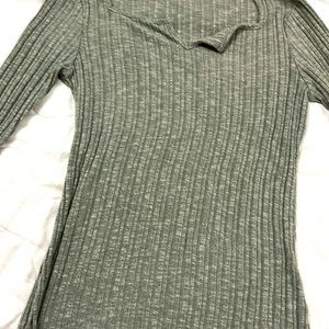 V-neck light green long sleeve .